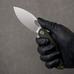 Satin G064 in hand – open, Army Green handle