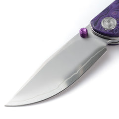 Close-up of OLITANS Gecko SE G080 gradient mirror-polished SLD-Magic drop-point blade