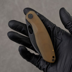 PEI version closed in hand – black blade shown