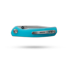 Closed OLITANS Gecko SE G080 Blue Acrylic knife showing reversible pocket clip