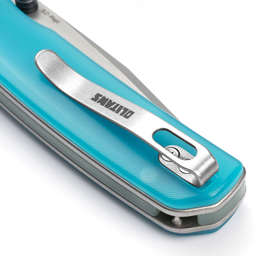 Close-up of OLITANS Gecko SE G080 blue acrylic handle and reversible pocket clip