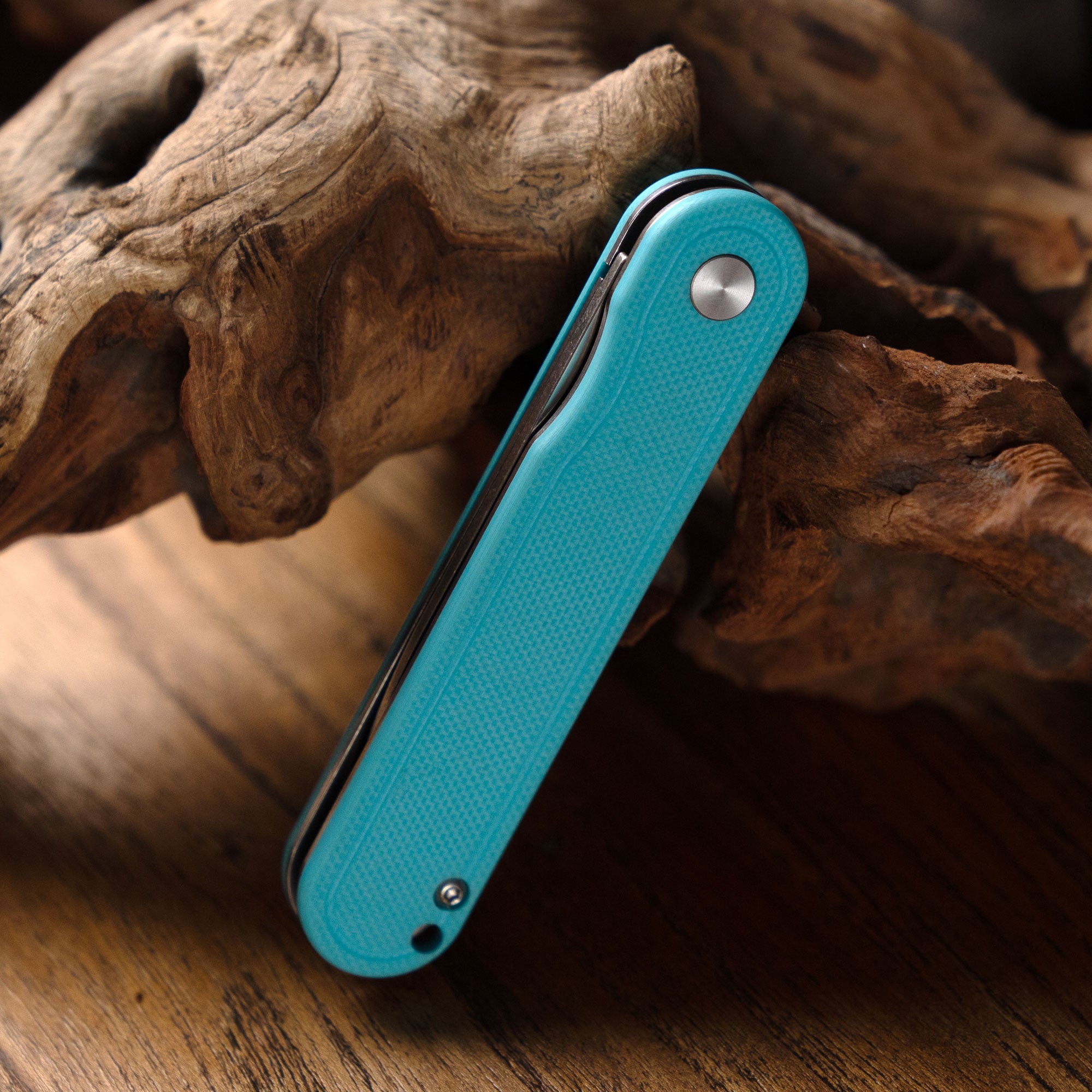Rocket G040 (2.75''+D2+Cyan G10)-Liner Lock-Flipper